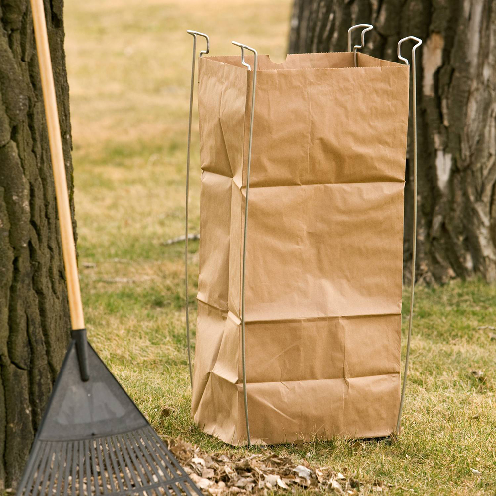 55 Gallon Bag Buddy Contractor Bag Holder Being Used for heavy Duty Yard Work Holding a Paper Bag