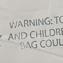 Close up of 13 x 8 x 22 HDPE Plastic Thank You Take Out Bag Suffocation Warning