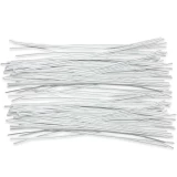 Group of 10 Inch White Plastic Twist Ties Scattered Out