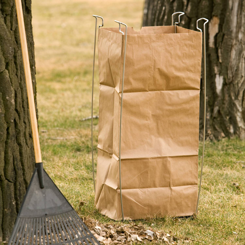 Contractor 55 Gallon Bag Buddy Helping to Clean Up Yard