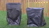 Bag Buddy Bag Holders - Home Pack set up outside on a grass yard