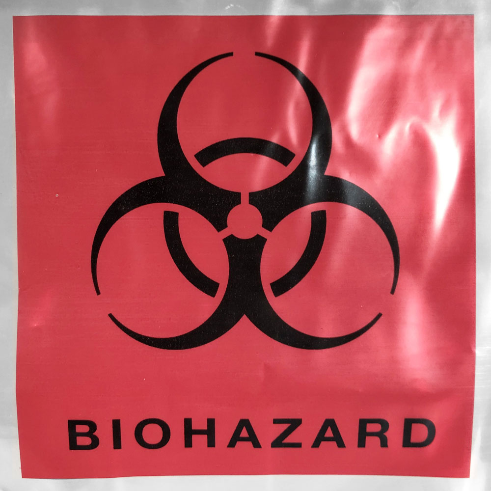 Close up of 3 Wall 6 x 9 2 mil Specimen Shield Zipper Locking Pouch Bags Red Biohazard Print
