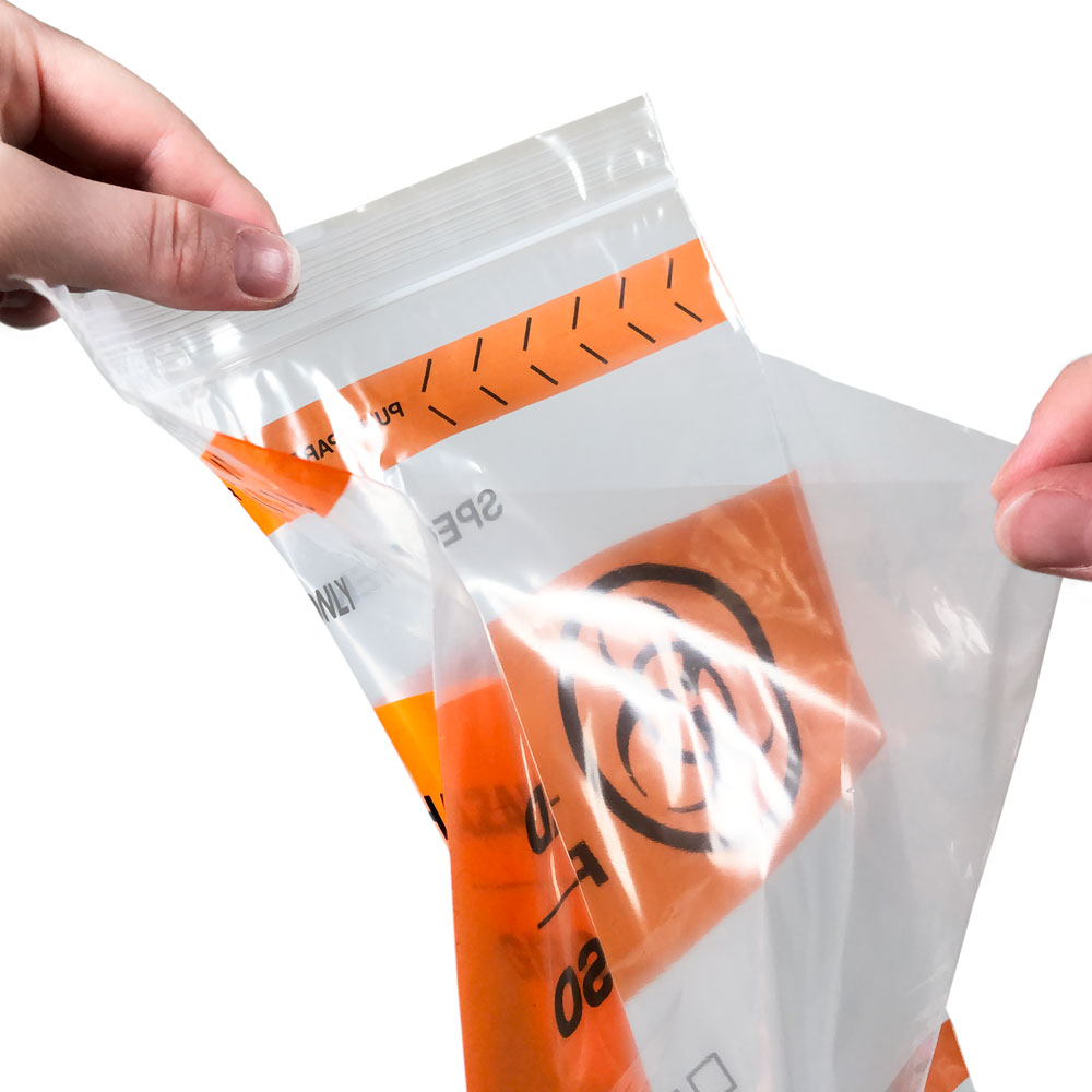 Close up of 12 x 15 Specimen Shield Tear Pouch Bags Black and Orange Document Pouch