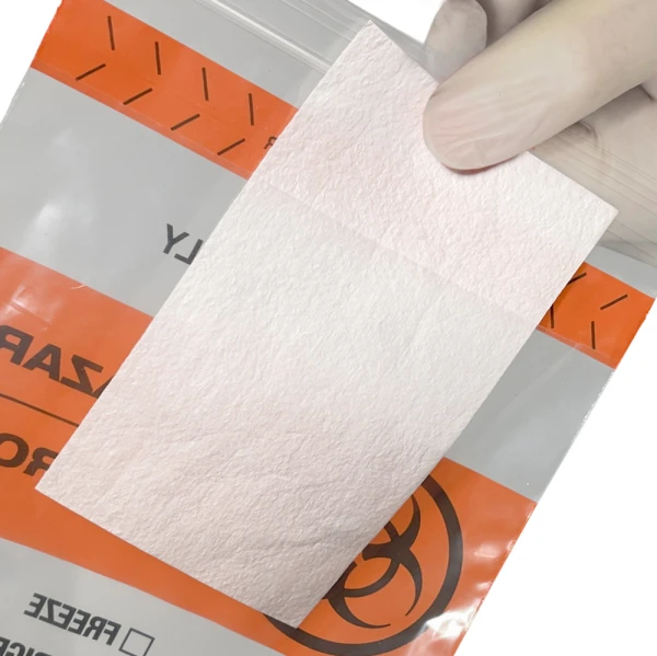 6 x 9 Biohazard Absorbent Pocket Side Specimen Bag 6 x 9 Biohazard White Absorbent Pad Being Slid Into Back Flap on Bag