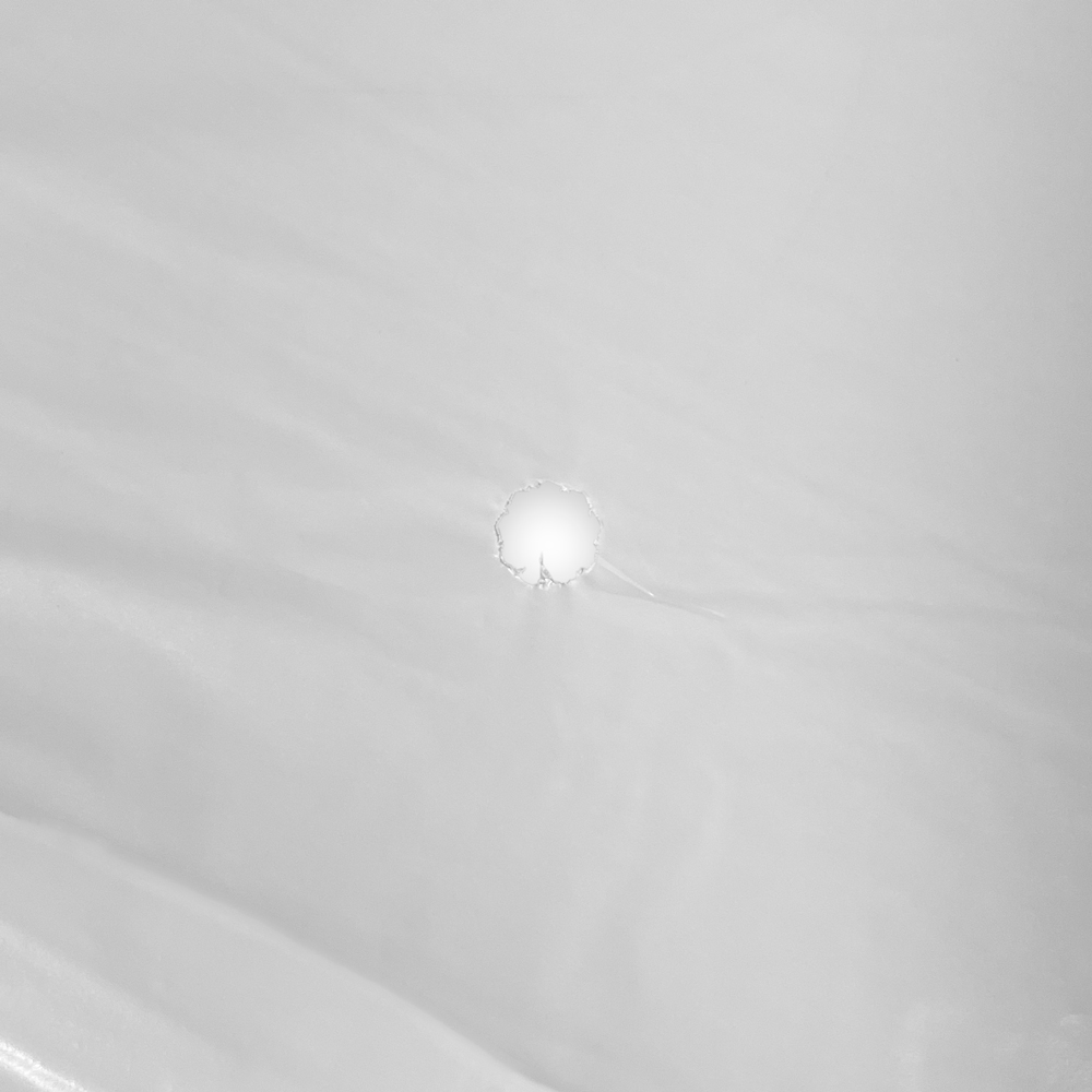 Close up of 18 x 19 1.25 Mil Earth Friendly Hotel Laundry Bag Vent Hole