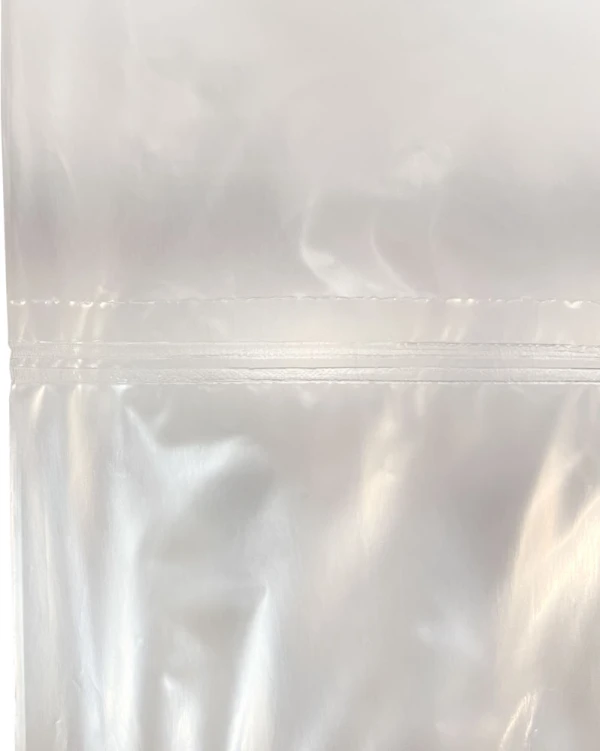 21 x 13 x 30 1 mil Gusseted Poly Bags on Roll Perforation and Seal Perforation and Seal of 21 x 13 x 30 .001 Gusseted Poly Bag on Roll