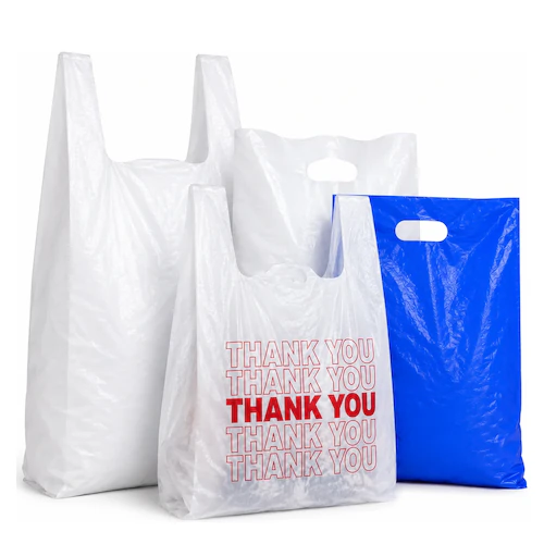 White plastic t-shirt shopping bags, a red thank-you print bag, and a blue die-cut handle bag.