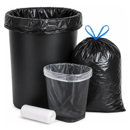 A black-lined commercial waste can, a tied trash bag, a clear-lined office bin, and a roll of liners.