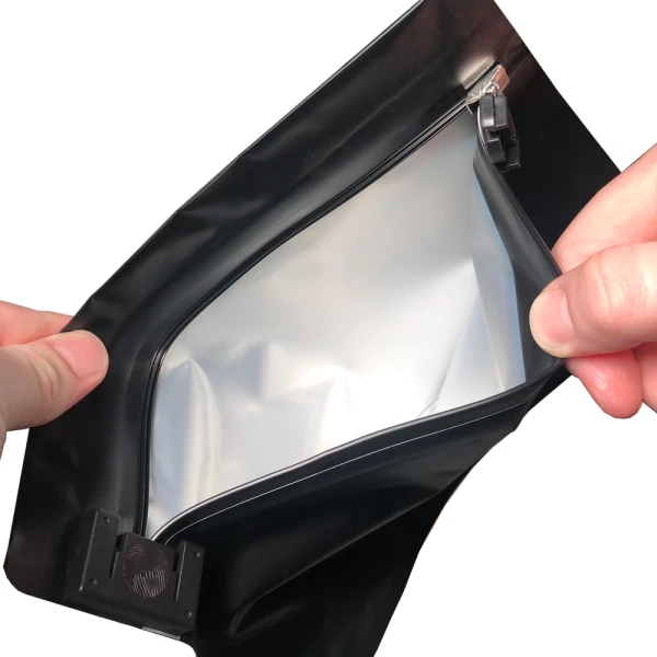 8 x 6 + 2.36 Child Proof Exit Bags Black 8 x 6 + 2.36 Child Proof Exit Bags Hands Holding Bag Open