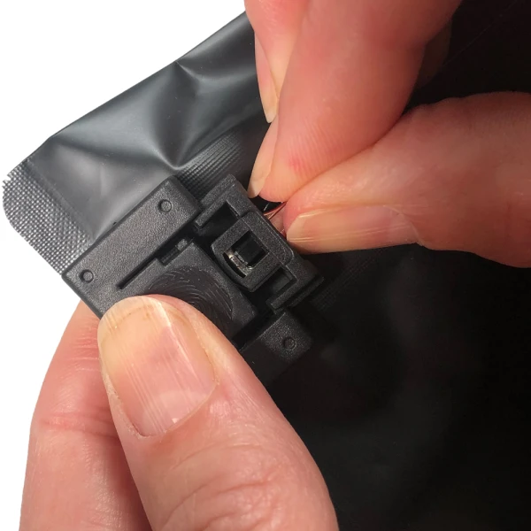 8 x 6 + 2.36 Child Proof Exit Bags Black 8 x 6 + 2.36 Child Proof Exit Bags Fingers Pushing Childproof Lock into Place