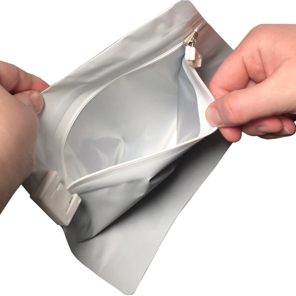 8 x 6 + 2.36 Child Proof Exit Bags 8 x 6 + 2.36 Child Proof Exit Bags Hands Holding Bag Open
