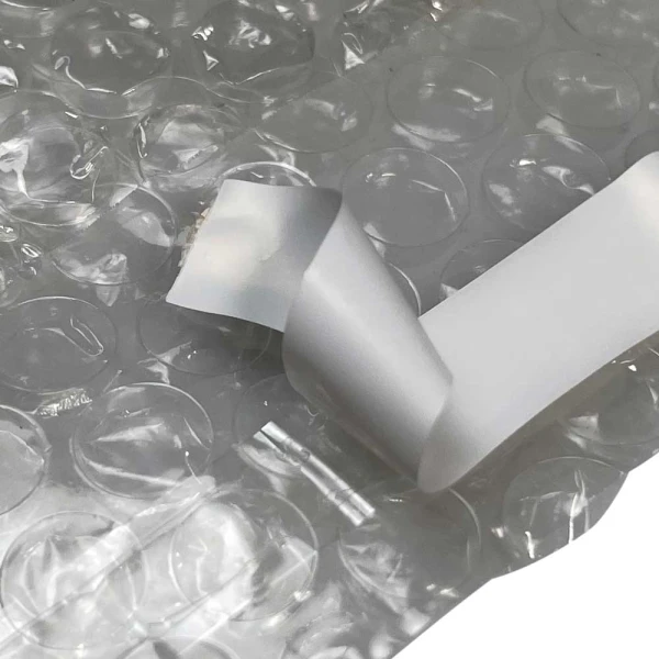 Self Sealing Bubble Out Bag with Released tape in a curl Self Sealing Bubble Out Bag with Released tape in a curl