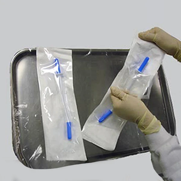 1. Firmly grasp the decanter’s container pouch at the end and peel open to expose the spiked end of the Bag Decanter. Medical professional removing IV Decanter from Sterile Pouch