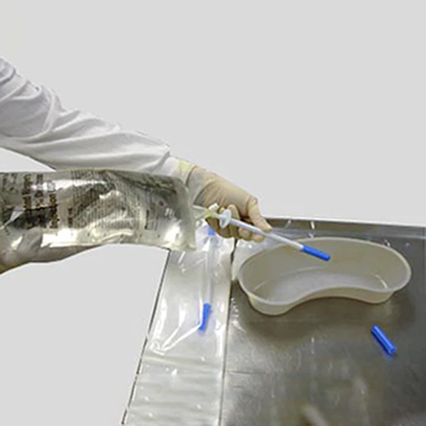4. Remove the spout cap and squeeze the container to dispense the contents as needed. Medical professional removing spout cap to dispenser needed contents from IV
