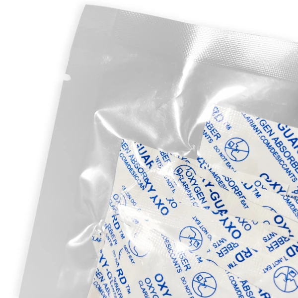 Oxy-Guard Oxygen Absorbing Packets 300cc Tear Notch Close up of Oxy-Guard Oxygen Absorbing Packets 300cc Tear Notch