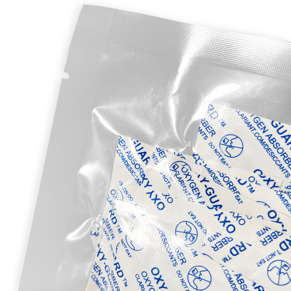 Close up of Oxy-Guard Oxygen Absorbing Packets 300cc Tear Notch
