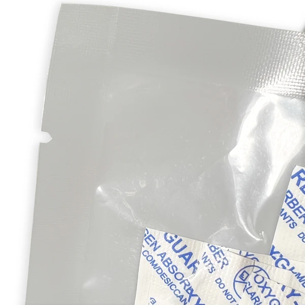 Oxy-Guard Oxygen Absorbing Packets 30cc Tear Notch Close up of Oxy-Guard Oxygen Absorbing Packets 30cc Tear Notch