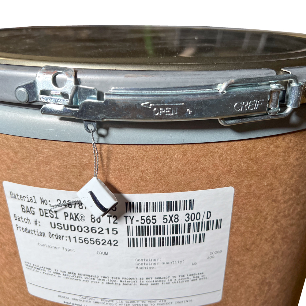 Close up of Tamper Evident Seal on 8 Clay Desiccant 5 x 8 - Desi Pak #3827 - Tyvek Paper Drum