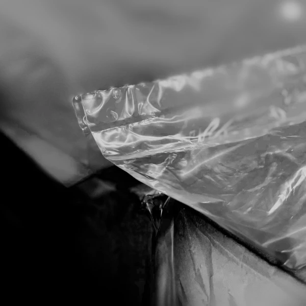 51 x 49 x 97 3 Mil Black Pallet Covers Perforation at Seal 51 x 49 x 97 3 Mil Black Pallet Covers Close Up of Perforation at Seal