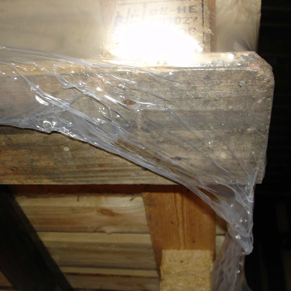 Shrink Wrap Securing Corner of Raised Pallet