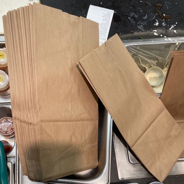 Double Life 20 lb. Shorty Heavy-Duty Brown Paper Bag Double Life 20 lb. Shorty Heavy-Duty Brown Paper Bag in Prep Area