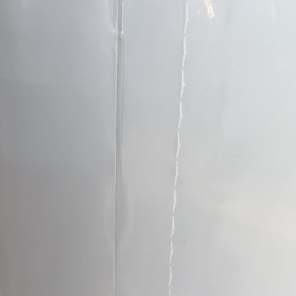 Bottom Seal and Perforation of a 3 Mil 38 x 65 Poly Bags on Roll