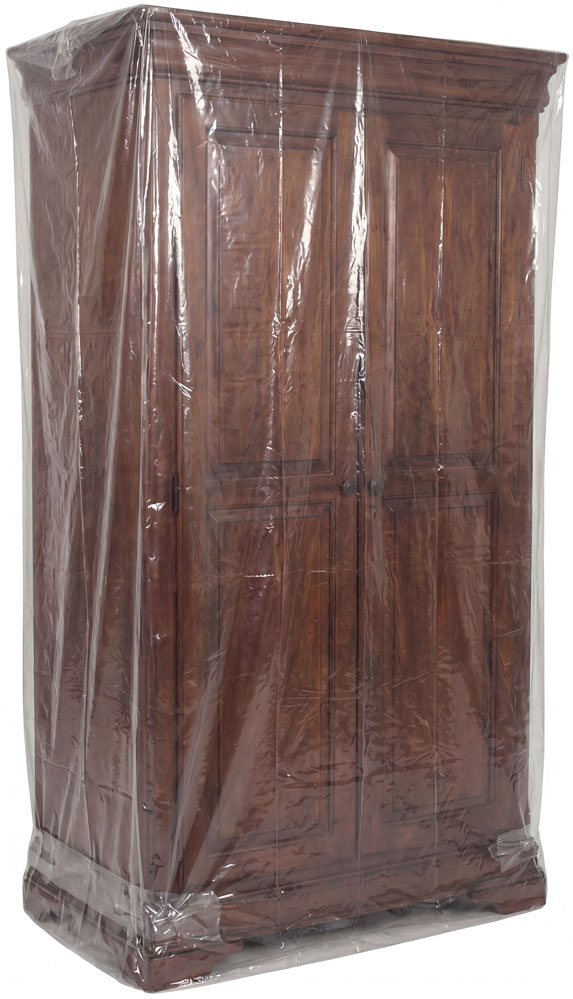 Protetving a piece of furniture with 3 Mil 38 x 65 Poly Bags on Roll