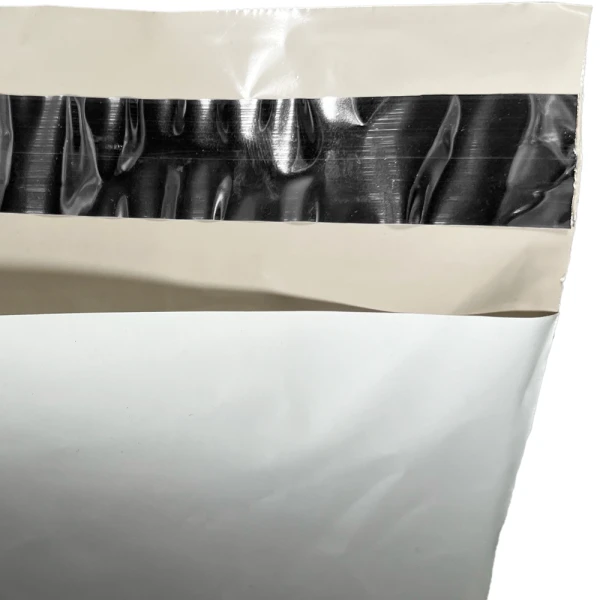 12 x 15.5 Poly Mailers - Non-Perforated Lip & Tape Lip and Tape of 12 x 15.5 Poly Mailers - Non-Perforated