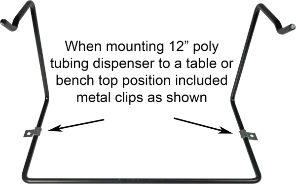 Securing 12 inch poly tubing dispenser to table top or work bench. Position of metal clips when mounting 12 inch poly tubing dispenser to table top or work bench.