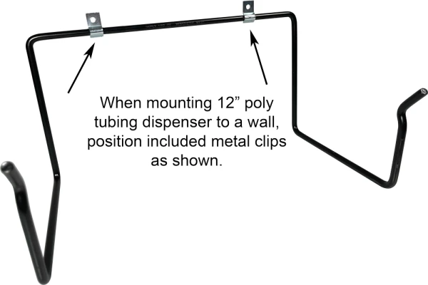 Securing 12 inch poly tubing dispenser to wall. Position of metal clips when mounting 12 inch poly tubing dispenser to wall.