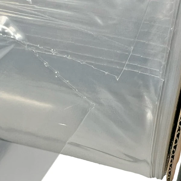 6 x 9 1.5 Mil Auto Bags with Suffocation Warning Perforation Perforation of 6 x 9 1.5 Mil Pre-Opened Bags On Roll For Automated Bagging