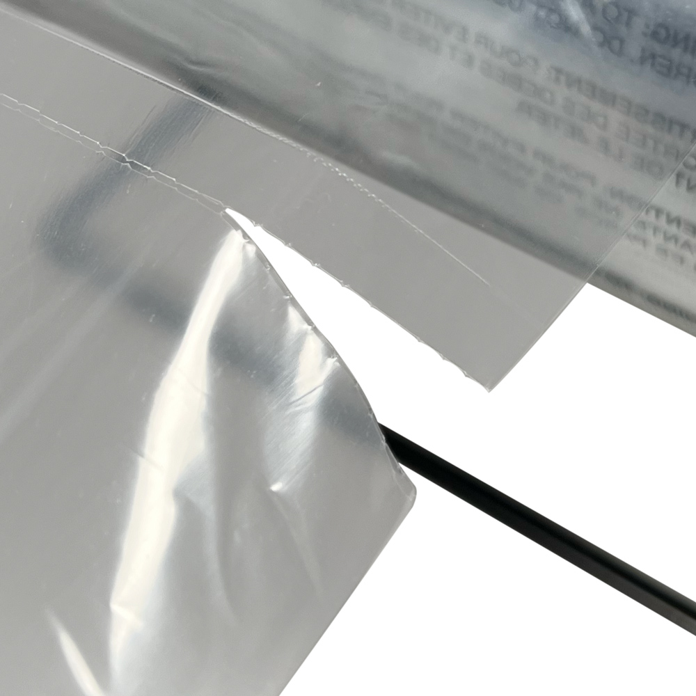 Perforation of 9 x 12 1.5 Mil Pre-Opened Bags On Roll For Automated Bagging