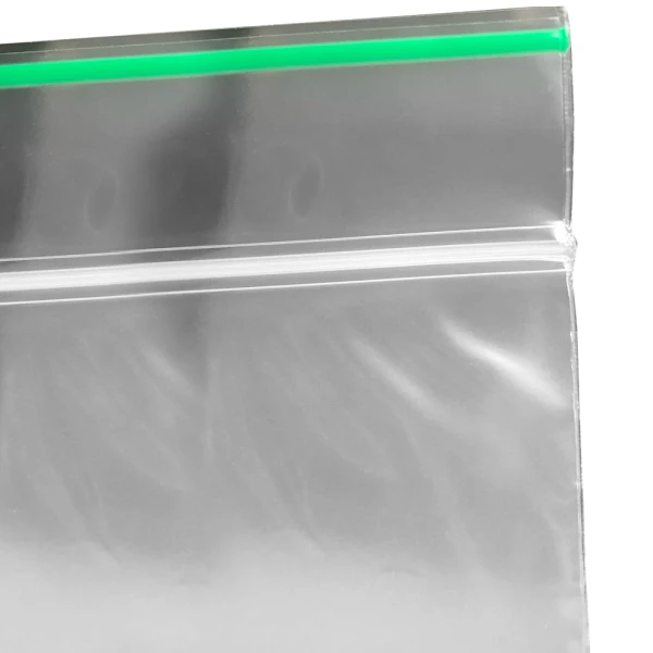 2 x 2 2 Mil Minigrip Greenline Biodegradable Reclosable Bags Zipper Close up of 2 x 2 2 Mil Minigrip Greenline Biodegradable Reclosable Bags Zipper and Green Line Lip