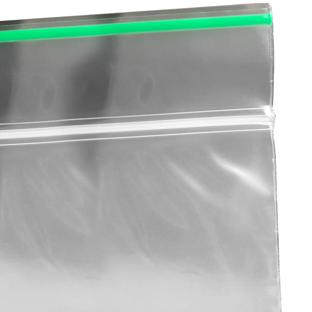 Close up of 2 x 2 2 Mil Minigrip Greenline Biodegradable Reclosable Bags Zipper and Green Line Lip