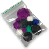3 x 4 Biodegradable Reclosable 2 Mil Zipper Bags Application Shot of Bag with Small Pom Poms