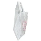 Close up of 11.5 x 6.5 x 21 Thank You Carry Out T-Shirt Bags 0.6 Mil Side Gusset