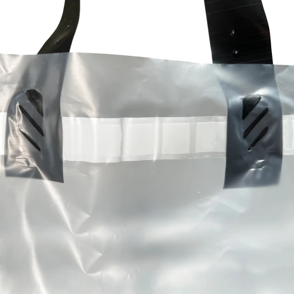 21 x 15 + 10 Tamper-Resistant Delivery Bag 21 x 15 + 10 Tamper-Resistant Delivery Bag Close Up of Handle Sealed to Bag