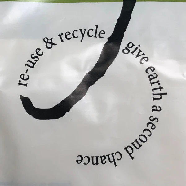 24 x 14 + 11 BG Enjoy Ameritote Soft Loop Handle Carry Bags 24 x 14 + 11 BG Enjoy Ameritote Soft Loop Handle Carry Bags Close Up of Re-Use and Recycle Give Earth A Second Chance Printed on Front of Bag