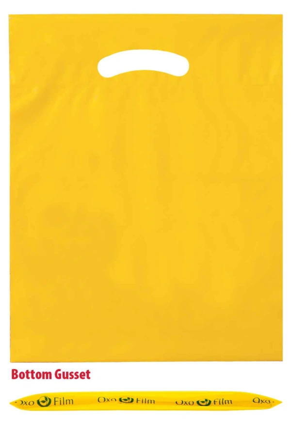 9 x 12 x 2 BG fold over die cut handle bags 9 x 12 plus 2 yellow fold over die cut handle bags