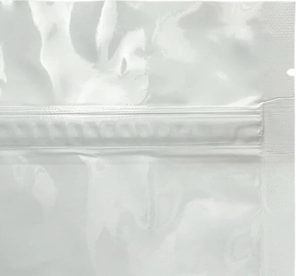 6 x 10 + 2.5 White Child Resistant Stand Up Pouches Tear Notch Tear Notch of White 6 x 10 + 2.5 Child Resistant Stand Up Pouches
