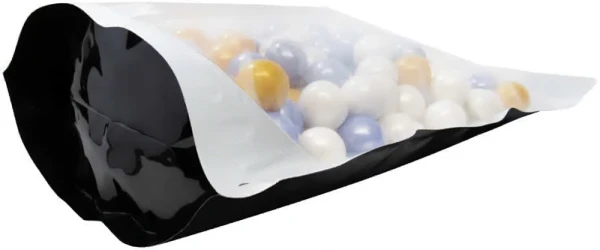 Clear/Black 5 lb Stand Up Pouch Bottom Gusset Bottom of Clear/Black 5 lb Stand Up Pouch Bottom Gusset with Multi Colored Candy
