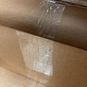 Hot Melt 2.2 mil 3 inch x 110 yds Clear Carton Sealing Tape on Cardboard Shipping Box