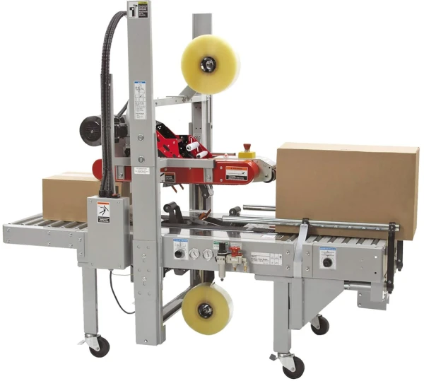 2 Inch x 1000 Yds 1.6 Mil Clear Hot Melt Tape - 6/Pack on Taping Machine 2 Inch x 1000 Yds 1.6 Mil Clear Hot Melt Tape - 6/Pack on Taping Machine