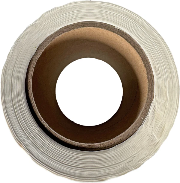 1.5 x 3.5 Resealable Tape Strips for Laminated Bags - 1000/Roll 3 Inch Core 3 Inch Core of 1.5 x 3.5 Reusable Tape Strips for Bag Sealing - 1000/Roll