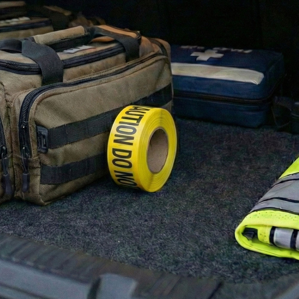 Caution Do Not Enter Barricade Tape - Yellow in Police Cruiser Trunk