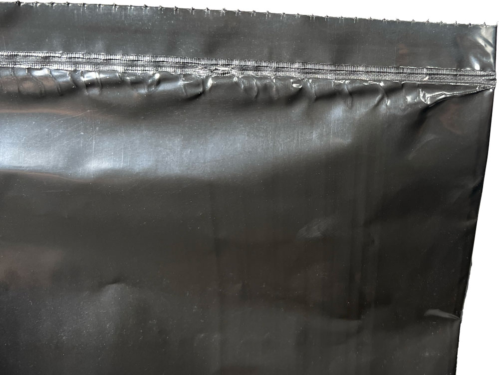 Perforation and Bottom Seal of Black 32 x 45 3 Mil 42 Gallon Contractor Bags