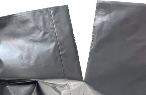 33 Gallon Repro Trash Bags - 2 Mil - 100/case Perforation Perforation of 33 Gallon Black Repro Garbage Bags 33 x 39