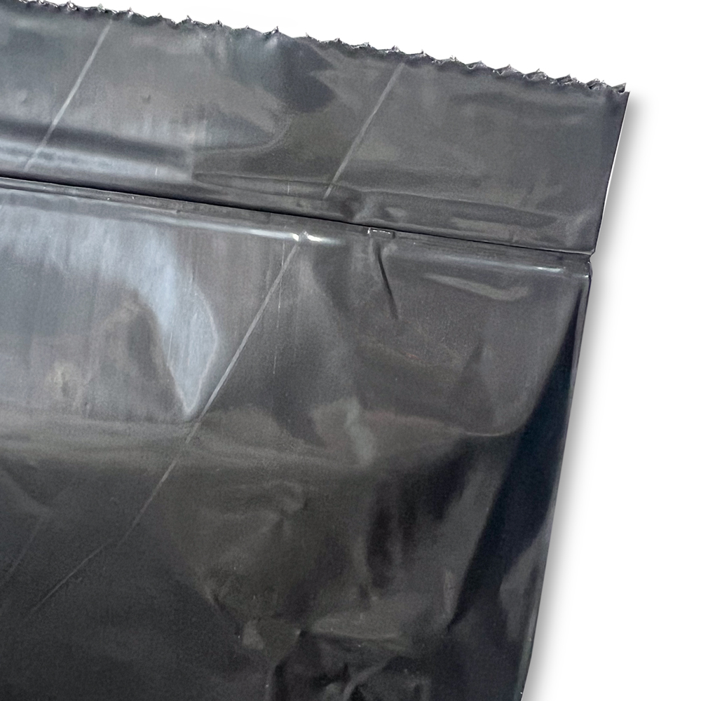Perforation of 40-45 Gallon Black Repro Garbage Bags 40 x 46