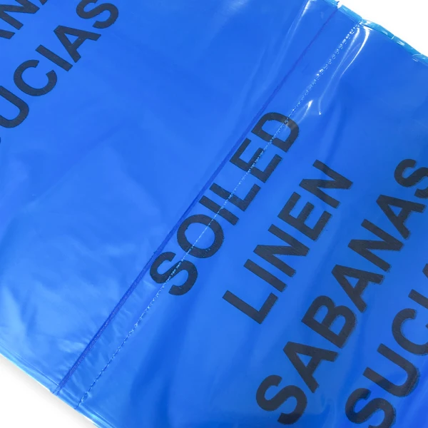 44 Gallon Soiled Linens Trash Bags - 1.3 Mil - 150/case Perforation Close up of 44 Gallon Soiled Linens Trash Bags - 1.3 Mil - 150/case Perforation connecting Trash Bags