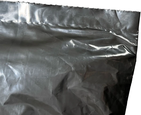 Perforation and Bottom Seal of Black 50 x 48 3 Mil 42 Gallon Contractor Bags